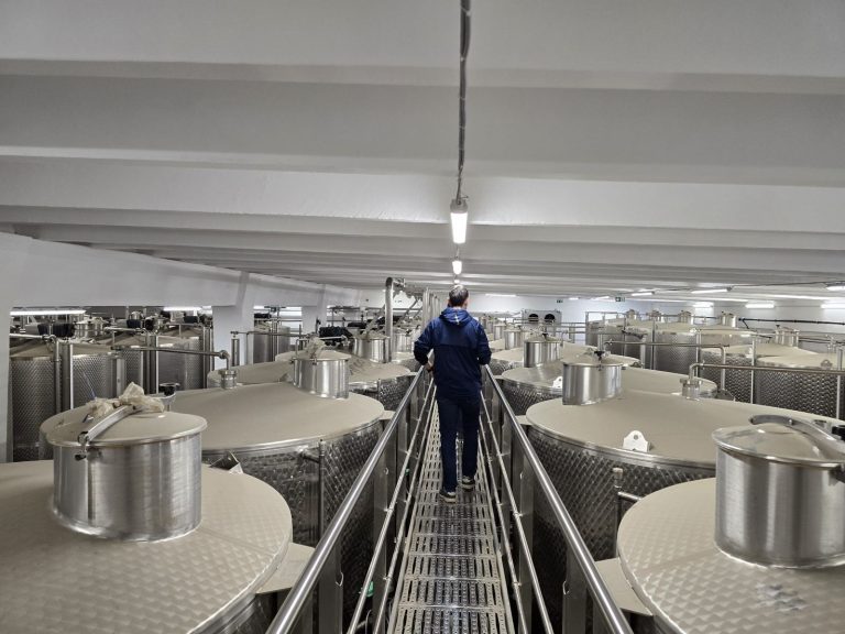 RAM project: Access walkway between the tops of stainless steel wine tanks
