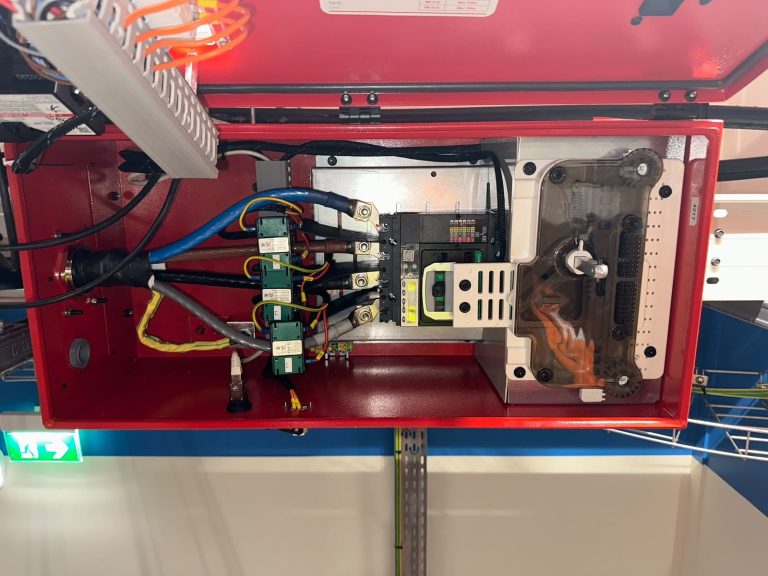 RAM project: Circuit breaker and power cable connections inside a data center distribution box