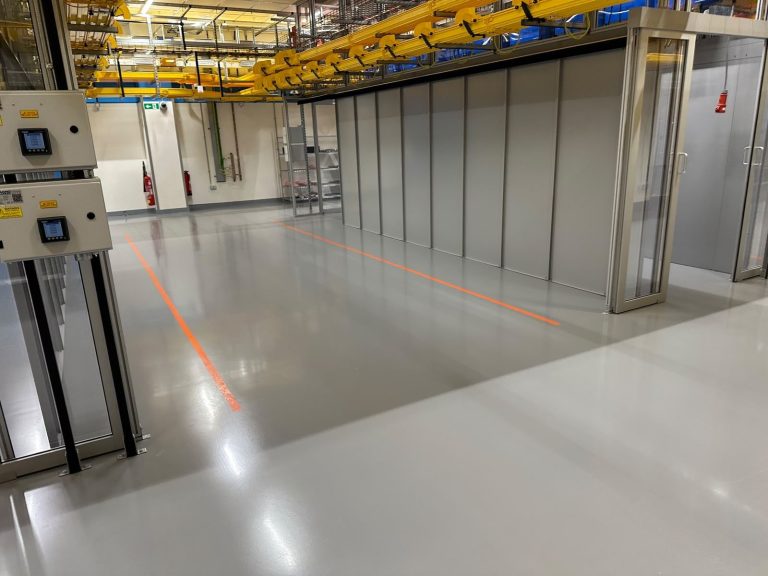 RAM project: Data center hall with overhead cable trays and electrical distribution panels in Frankfurt