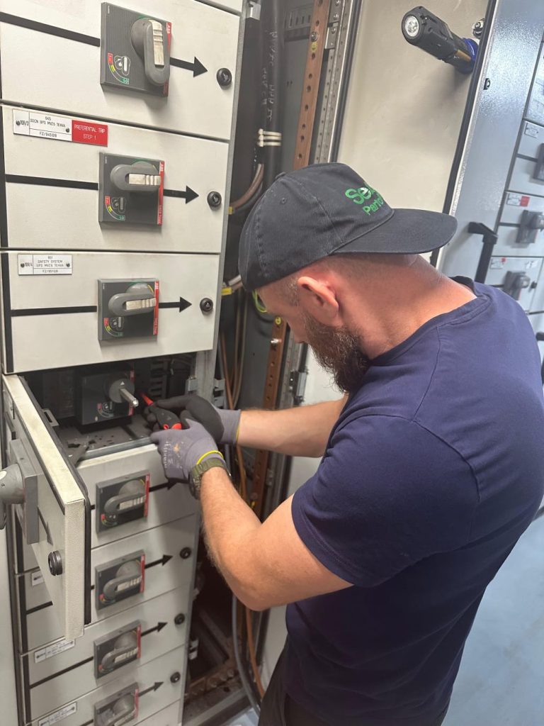 RAM project: Marine electrician working on a ship switchboard in Denmark