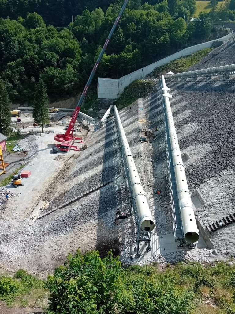 RAM project: Overview of the Fish Flow Project pipe installation at Lesu Dam in Bihor, Romania