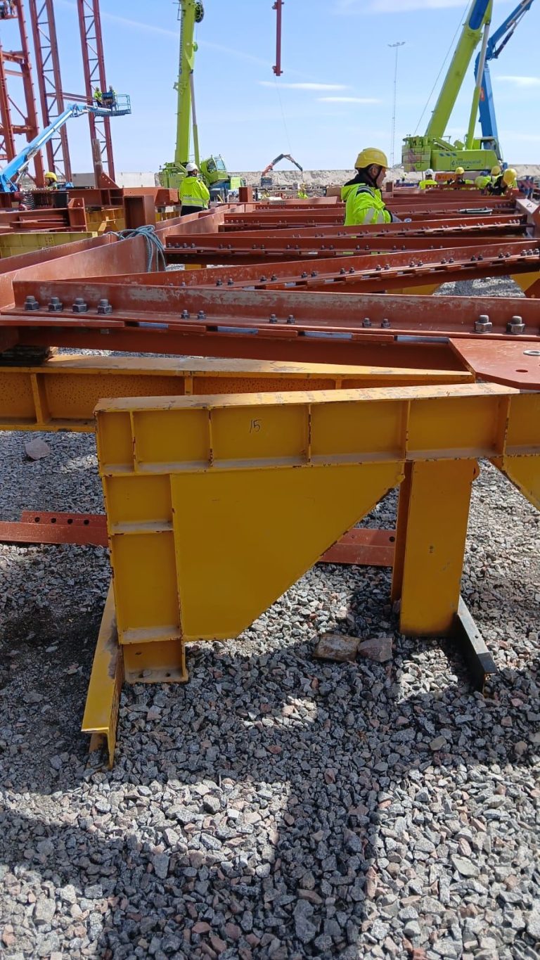 RAM project: Site team working around prefabricated steel beams at the Swedish data center project