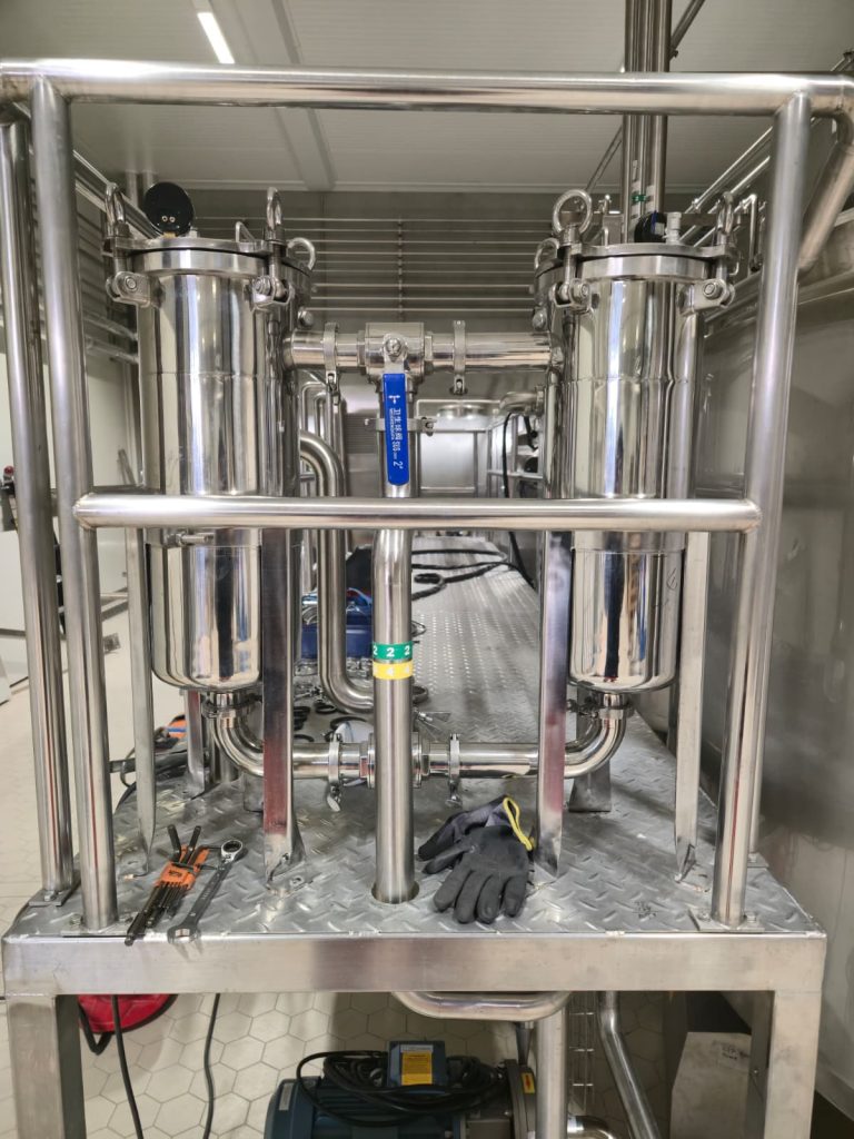 RAM project: Twin stainless steel filter housings and valves on a brewery equipment platform in Denmark
