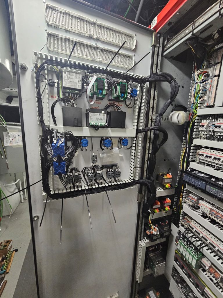 RAM project: Wiring on the inside of a marine control cabinet door